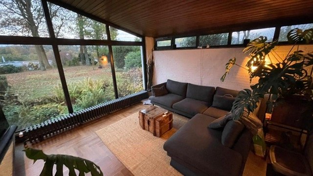 Wohnzimmer mit Blick in den Garten Wohnzimmer mit Blick in den Garten